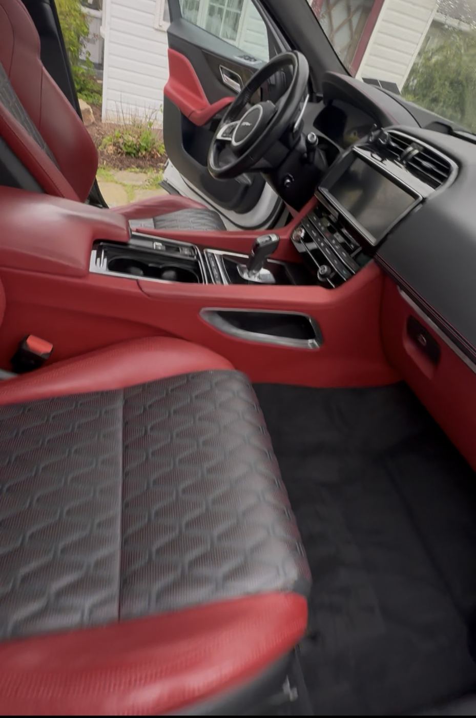 Jaguar F-PACE red leather interior after deep cleaning